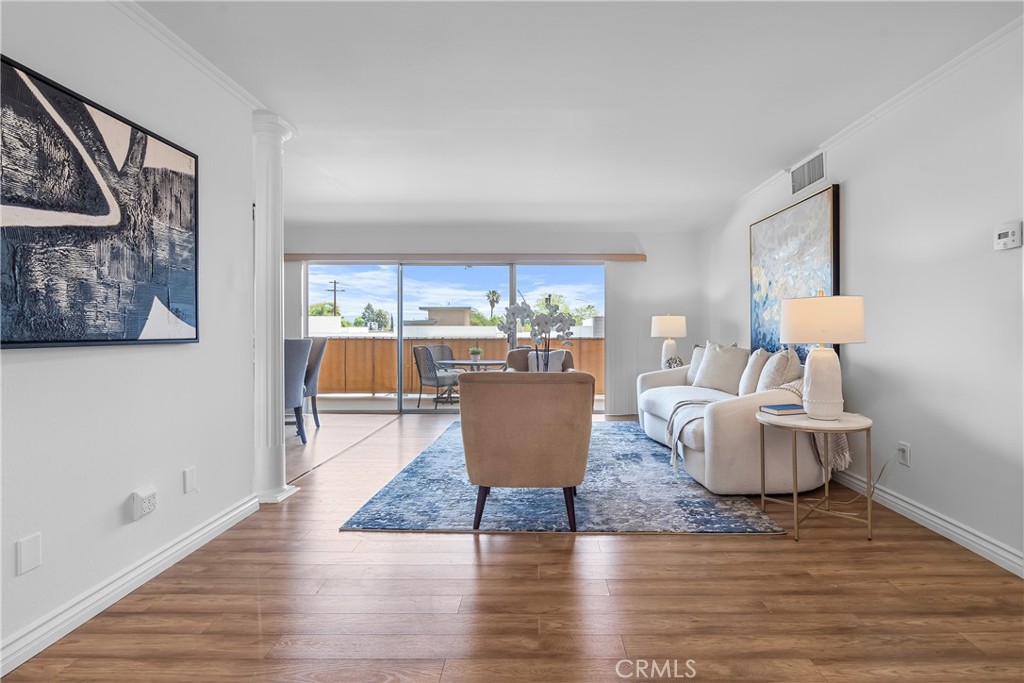 2468 Mohawk Street, Unit 202 Pasadena, CA 91107 - Photo 14 of 29 a living room with couches and a coffee table with wooden floor