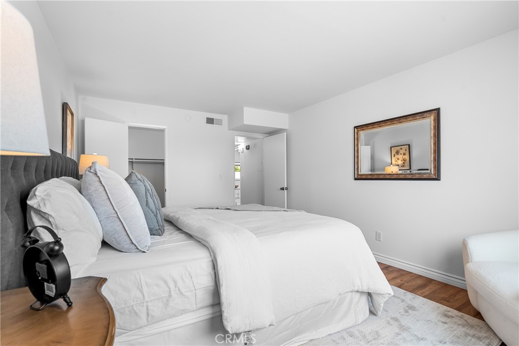 2468 Mohawk Street, Unit 202 Pasadena, CA 91107 - Photo 16 of 29 a bedroom with a bed and a couch