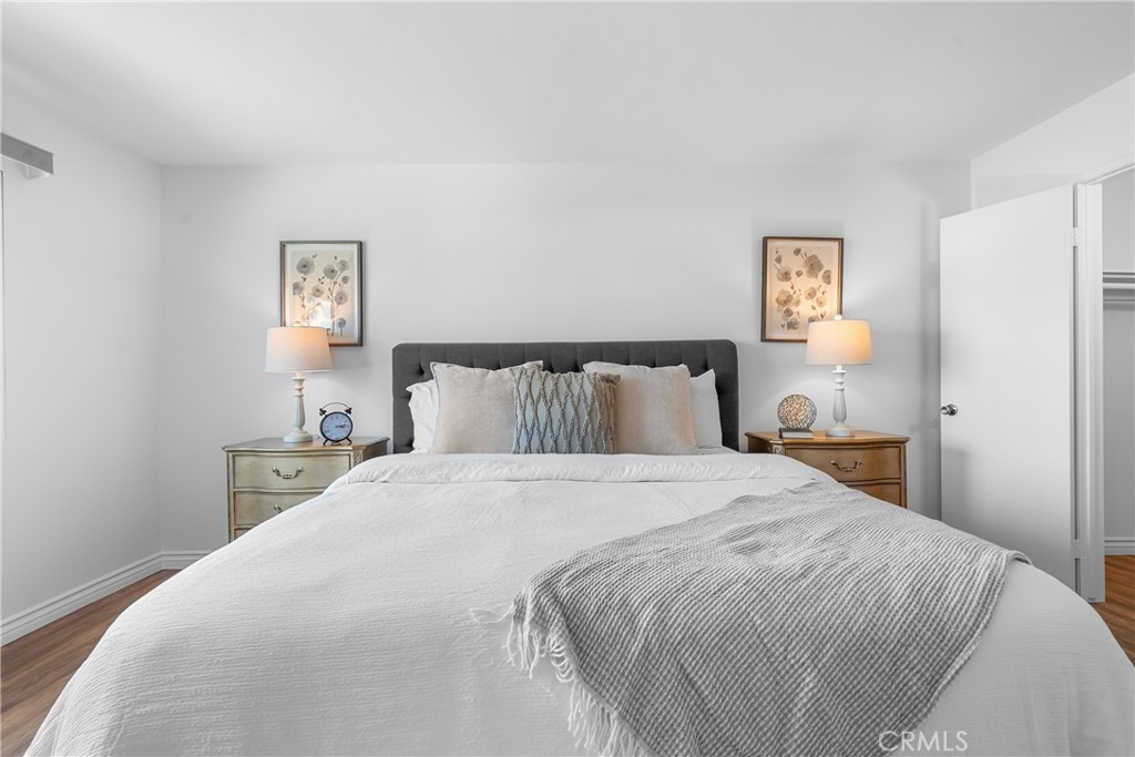 2468 Mohawk Street, Unit 202 Pasadena, CA 91107 - Photo 17 of 29 a bedroom with a bed and painting on the wall