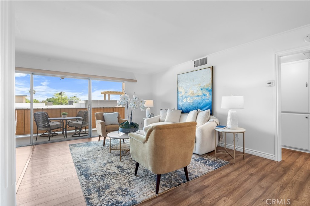 2468 Mohawk Street, Unit 202 Pasadena, CA 91107 - Photo 2 of 29 a living room with furniture a rug and a table