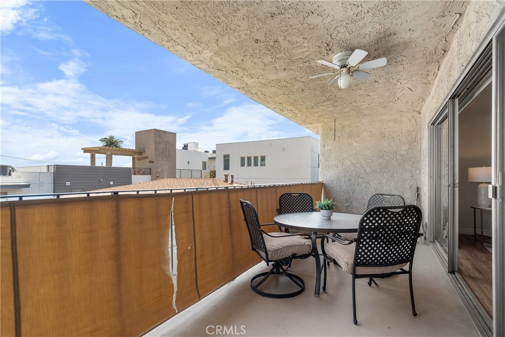 2468 Mohawk Street, Unit 202 Pasadena, CA 91107 - Photo 23 of 29 a balcony with table and chairs