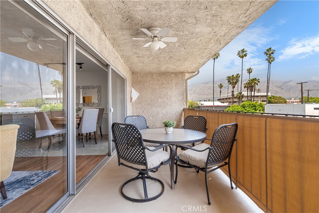 2468 Mohawk Street, Unit 202 Pasadena, CA 91107 - Photo 24 of 29 a dining room with furniture a chandelier and wooden floor