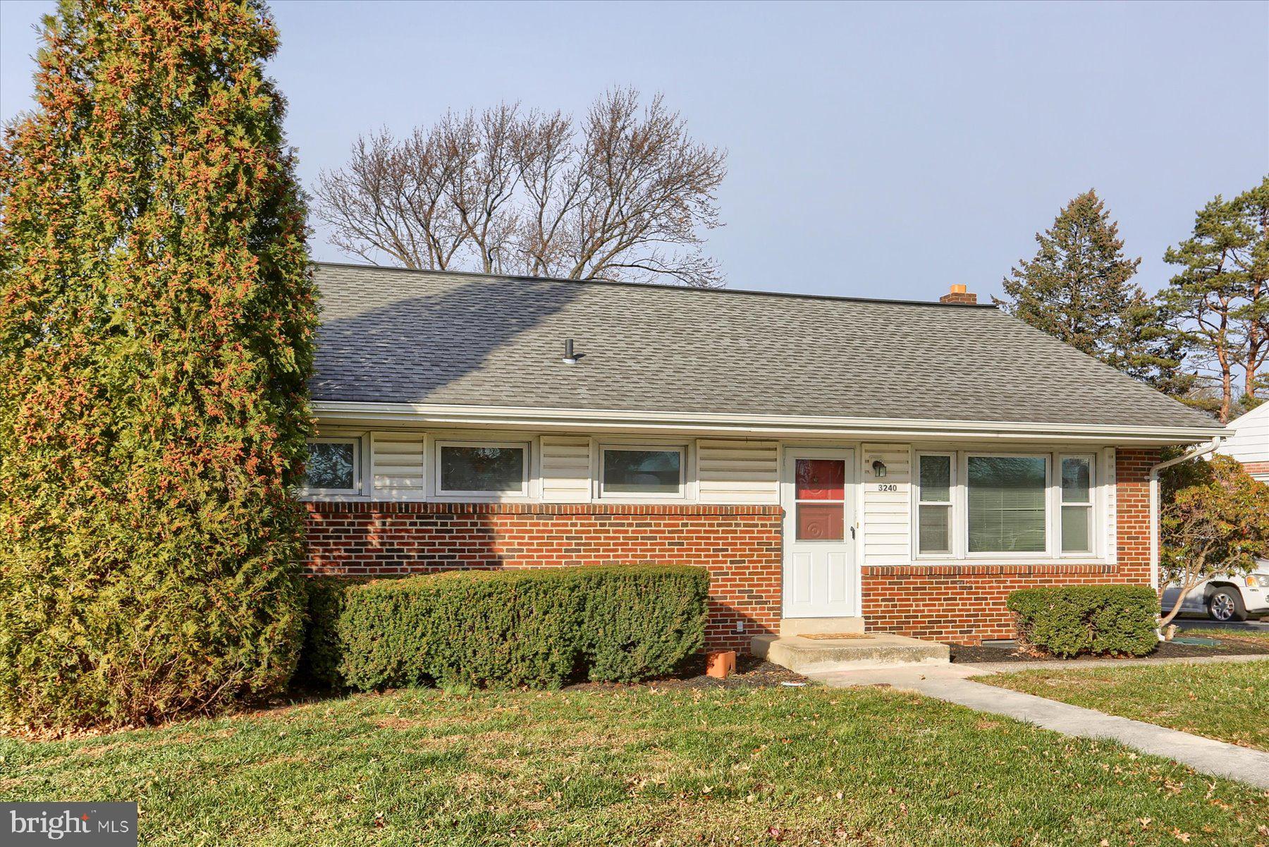 3240 Cloverfield Road Harrisburg, PA 17109 - Photo 2 of 28 front view of a house with a yard