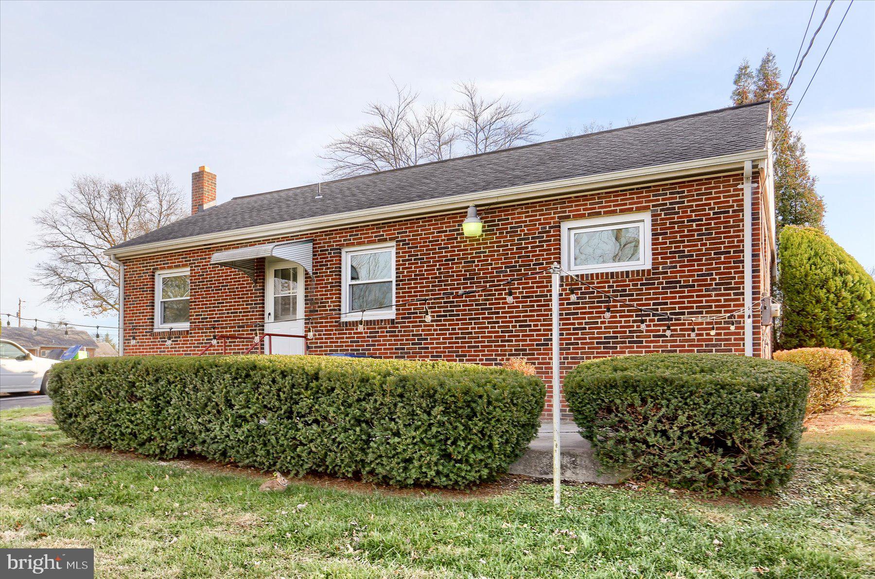 3240 Cloverfield Road Harrisburg, PA 17109 - Photo 23 of 28 a view of a house with a small yard and plants