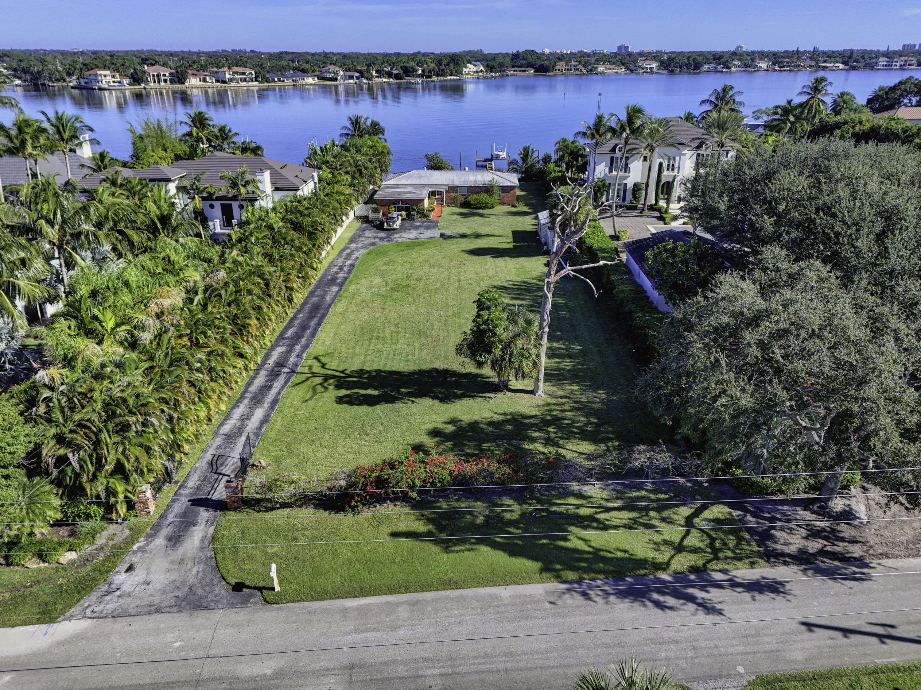 5297 Pennock Point Road Jupiter, FL 33458 - Photo 2 of 26 DJI_20251212104620_0027_D-2