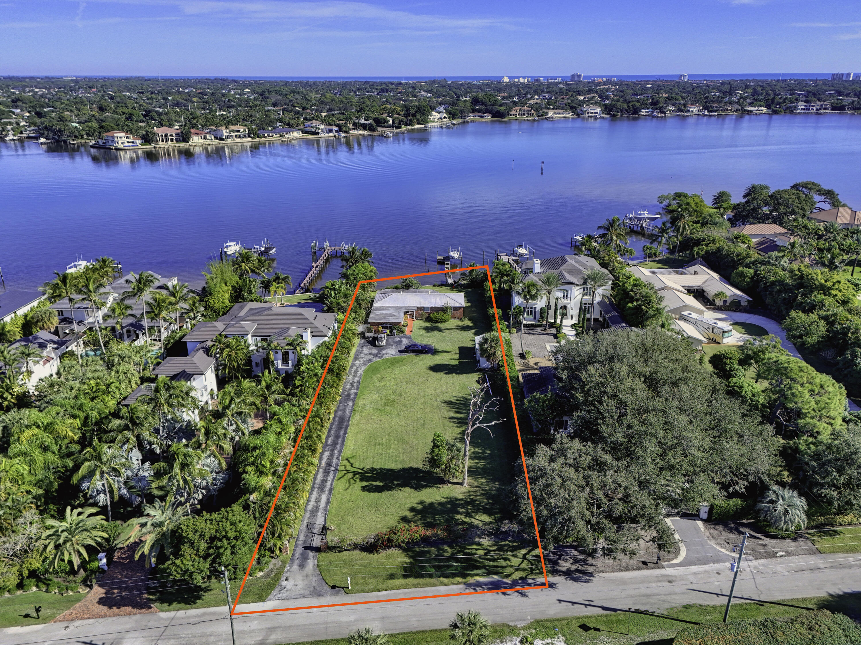 5297 Pennock Point Road Jupiter, FL 33458 - Photo 3 of 26 DJI_20251212104633_0032_D-2