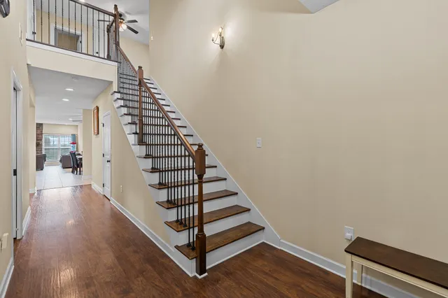 a view of a hallway with staircase