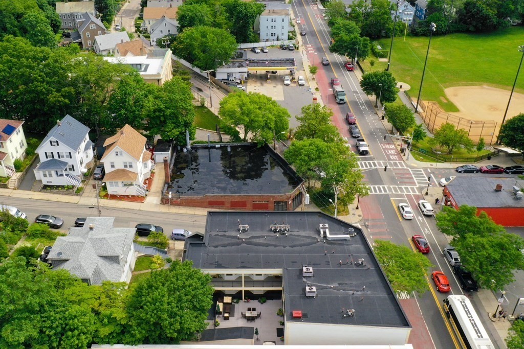 2 Lee Hill Road, Unit 6 Boston, MA 02131 - Photo 25 of 42 an aerial view of a house with a garden