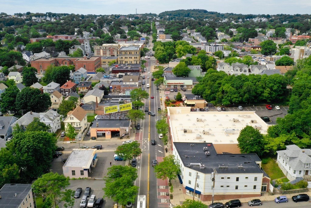 2 Lee Hill Road, Unit 6 Boston, MA 02131 - Photo 29 of 42 an aerial view of residential houses with outdoor space