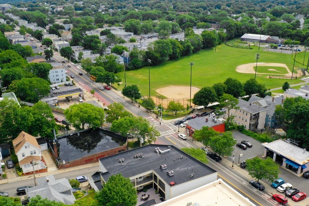 2 Lee Hill Road, Unit 6 Boston, MA 02131 - Photo 32 of 42 an aerial view of a house with a garden