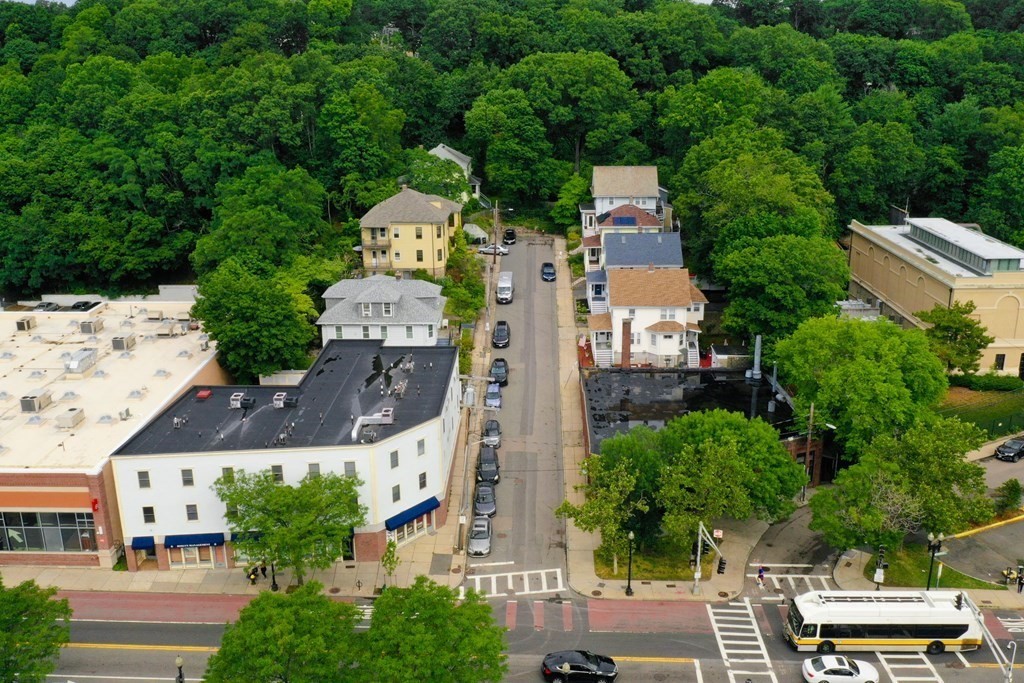 2 Lee Hill Road, Unit 6 Boston, MA 02131 - Photo 34 of 42 an aerial view of multiple houses with yard