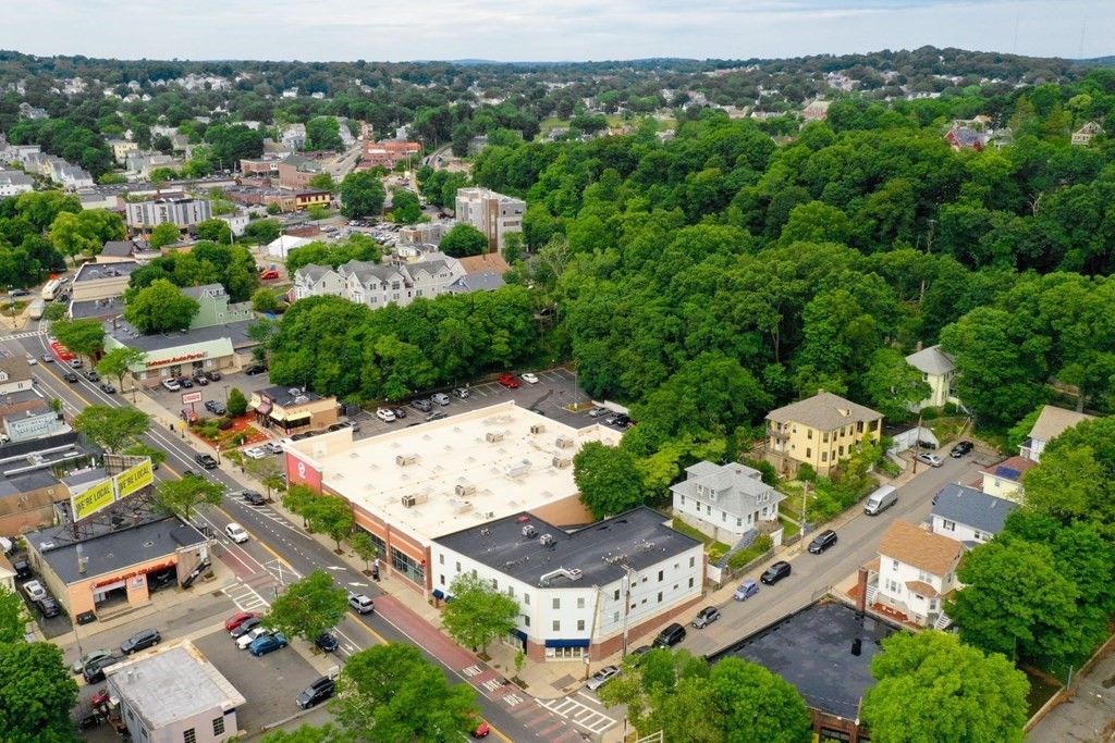 2 Lee Hill Road, Unit 6 Boston, MA 02131 - Photo 36 of 42 an aerial view of a house with a yard