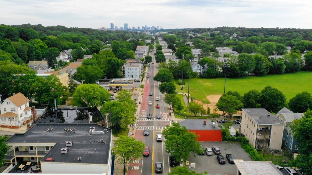2 Lee Hill Road, Unit 6 Boston, MA 02131 - Photo 37 of 42 an aerial view of a house with outdoor space