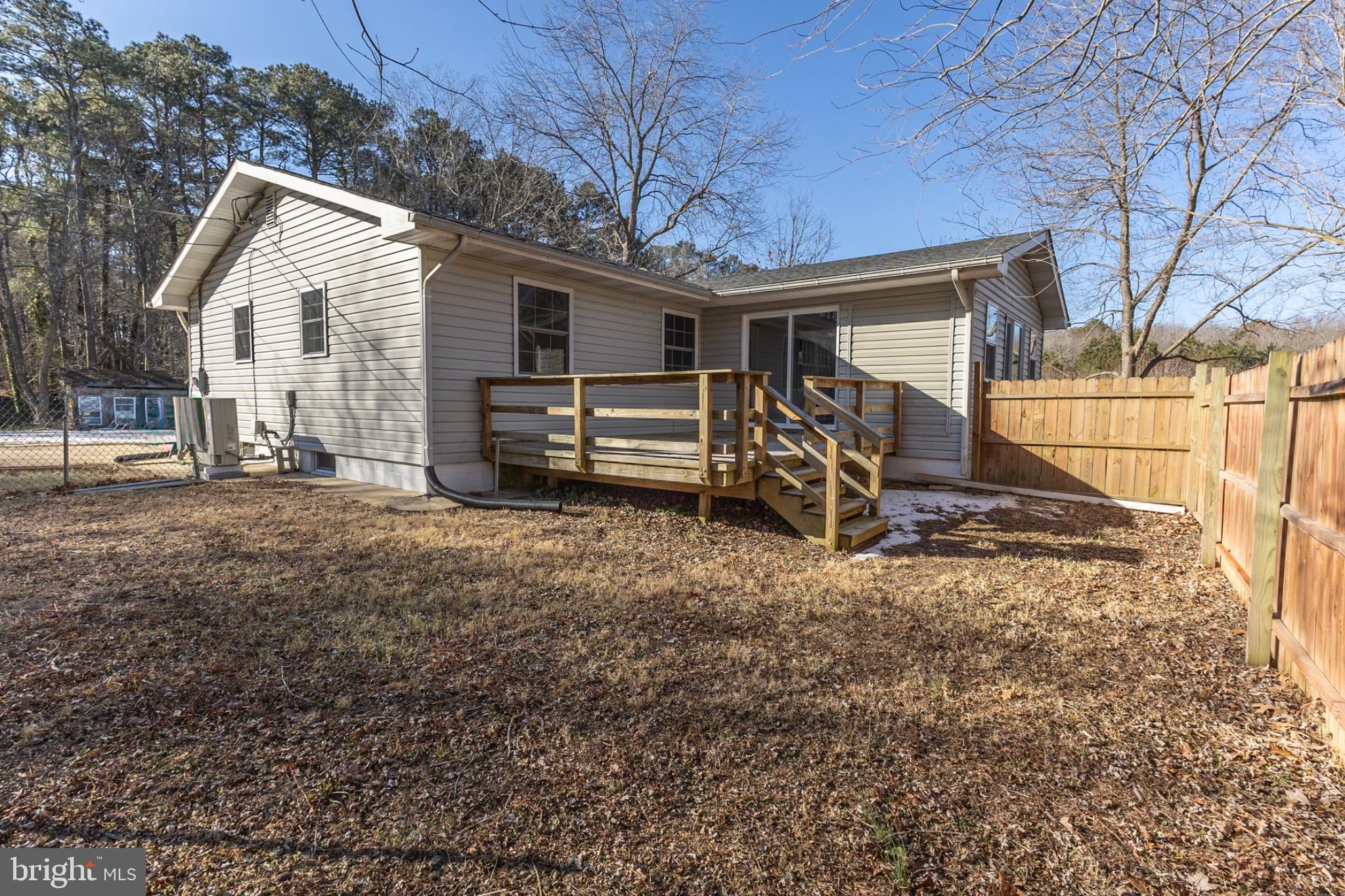 49151 Wynne Road Ridge, MD 20680 - Photo 70 of 80 Charming home with spacious outdoor deck.