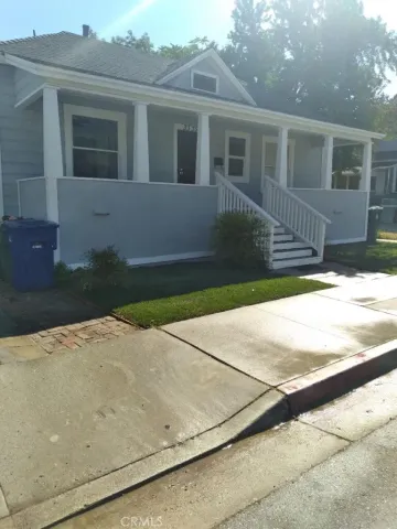 a house view with a backyard space