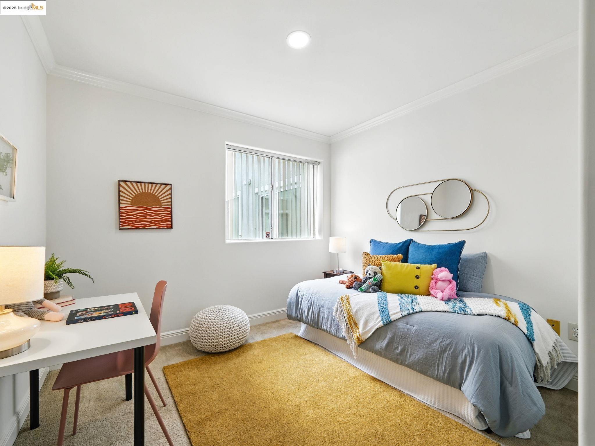 1515 14th Avenue, Unit 201 Oakland, CA 94606 - Photo 16 of 23 a bedroom with bed and a window