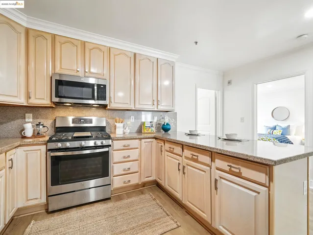 a kitchen with a stove and a microwave