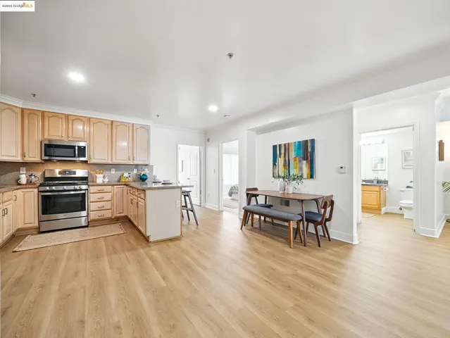 a kitchen with a table and chairs in it