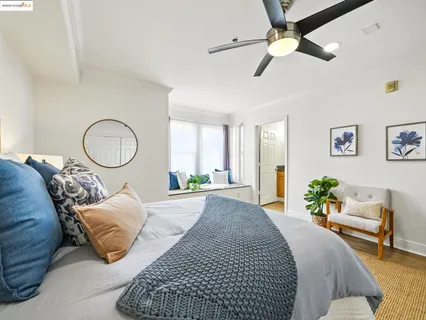 a bed room with a bed and a chandelier