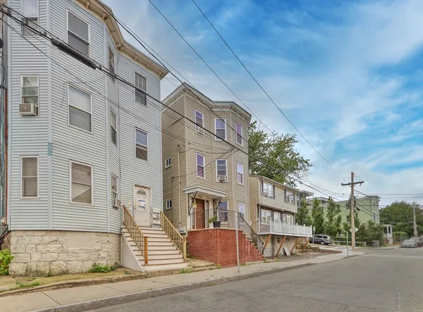 a front view of a building with street