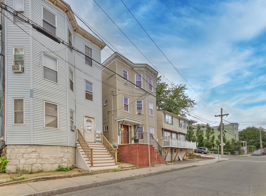 a front view of a building with street