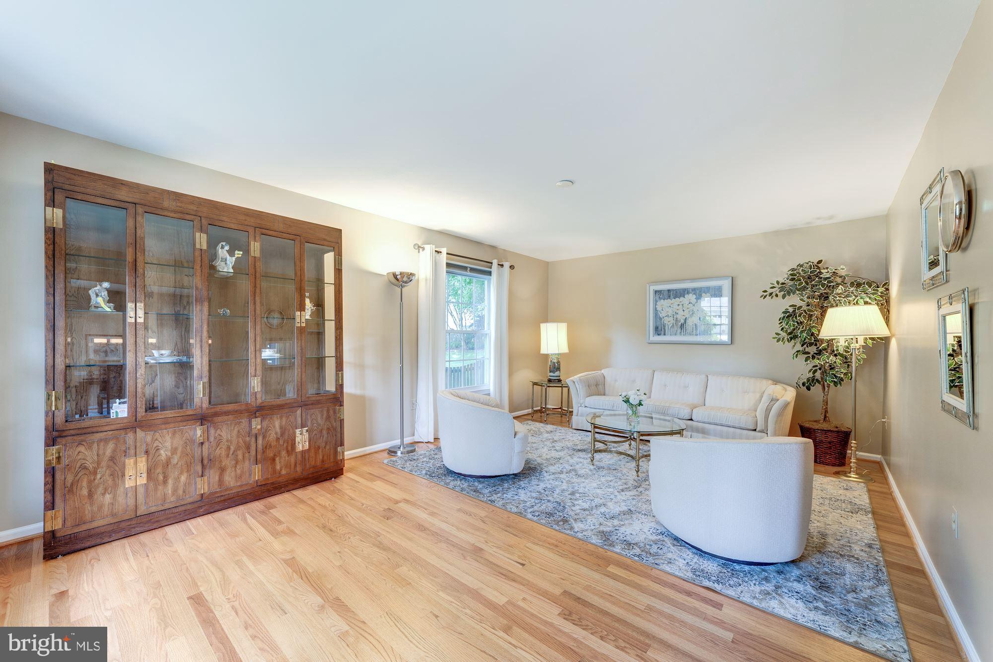 9116 Rockefeller Lane Springfield, VA 22153 - Photo 22 of 56 Living room also features hardwood floors