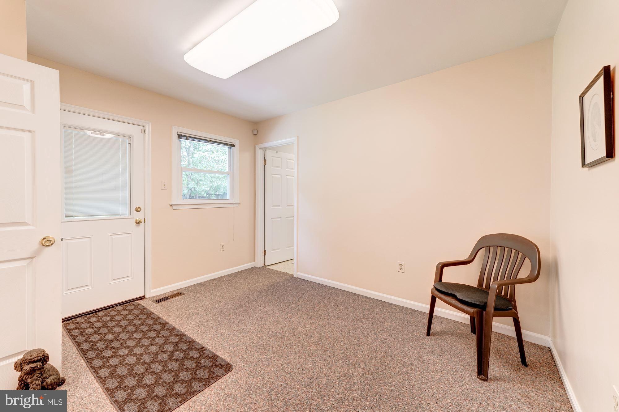 9116 Rockefeller Lane Springfield, VA 22153 - Photo 27 of 56 Very large mudroom between kitchen and garage