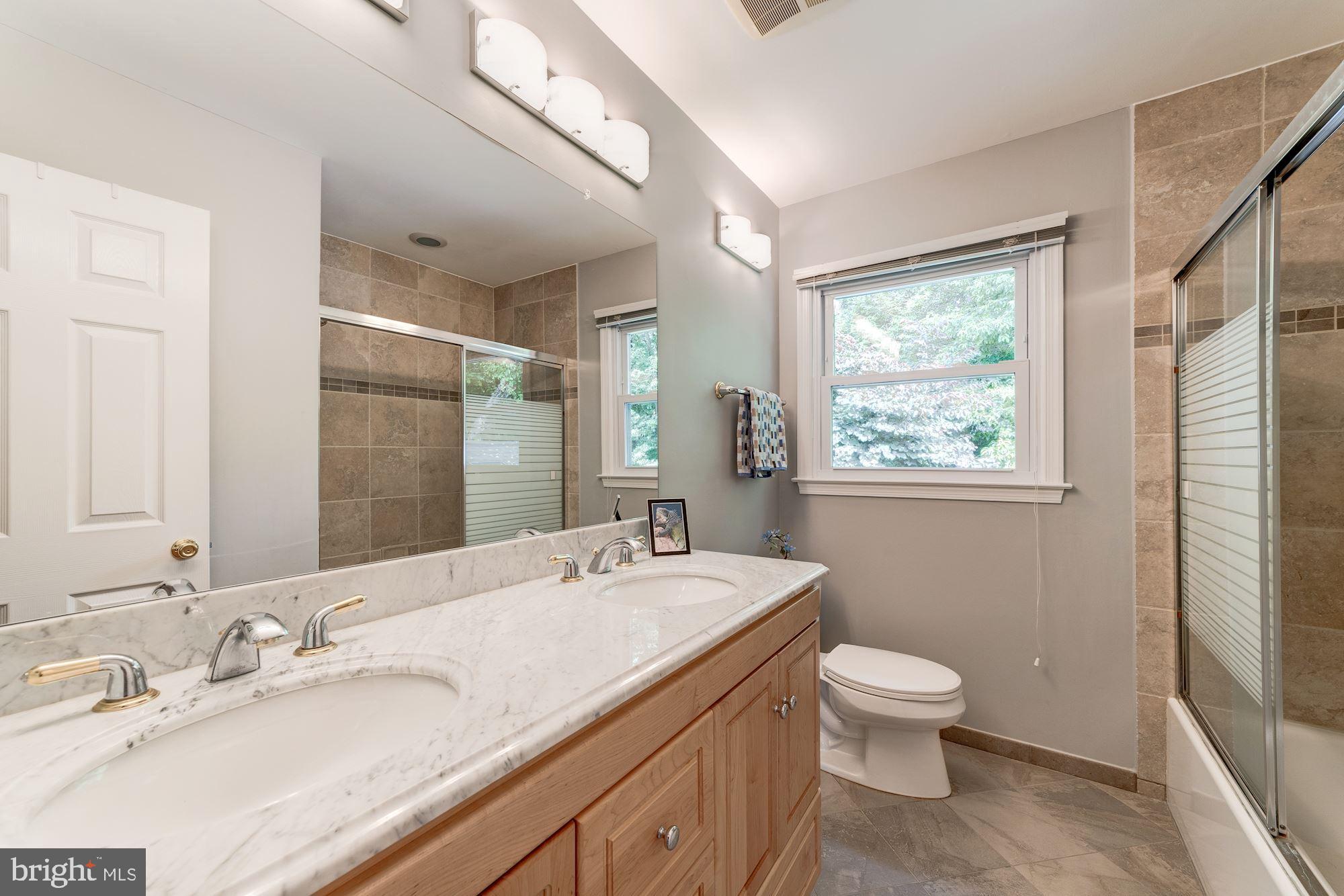 9116 Rockefeller Lane Springfield, VA 22153 - Photo 38 of 56 Upper level hall bath with dual sinks