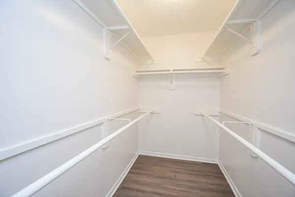 a view of an empty walk in closet