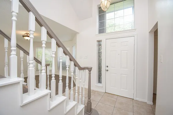 a view of an entryway with staircase