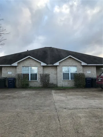 a view of a house with a garage