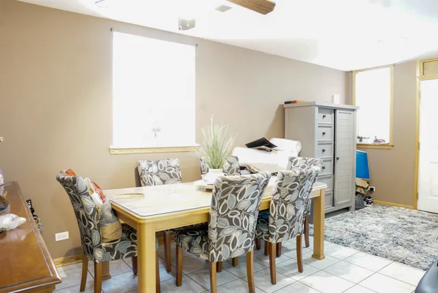 a view of a dining room with furniture