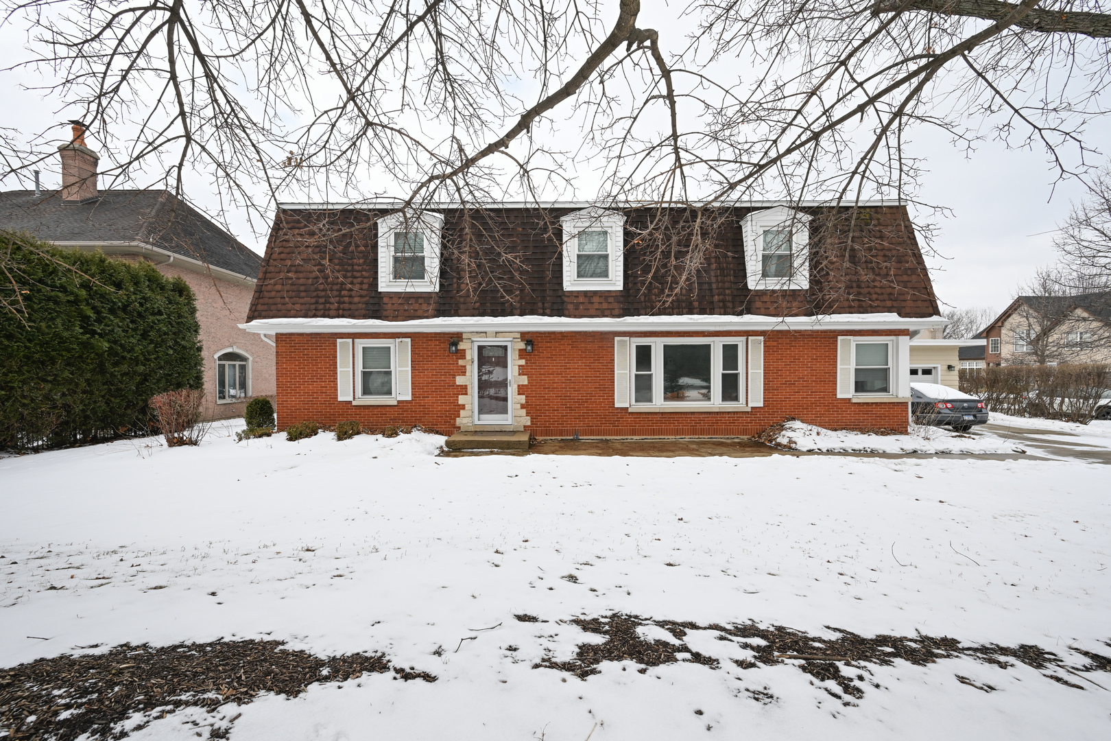360 Erie Circle Bloomingdale, IL 60108 - Photo 1 of 30 a front view of a house with a snow on the road
