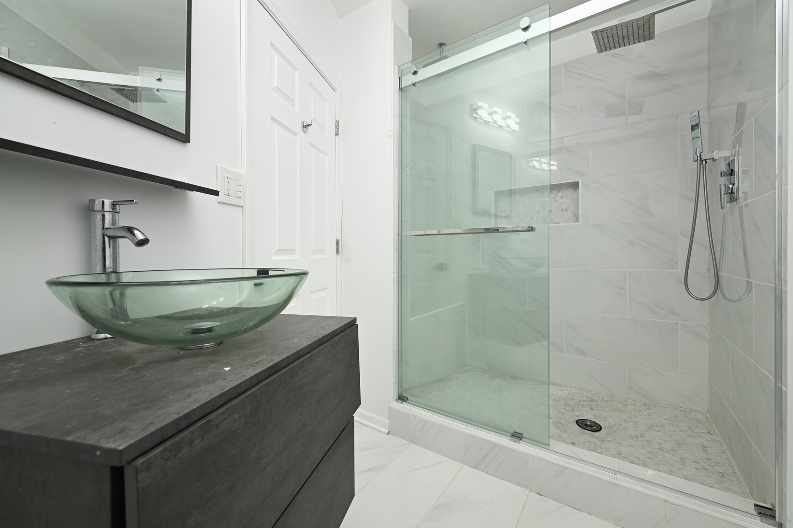 360 Erie Circle Bloomingdale, IL 60108 - Photo 13 of 30 a bathroom with a granite countertop sink a mirror and shower