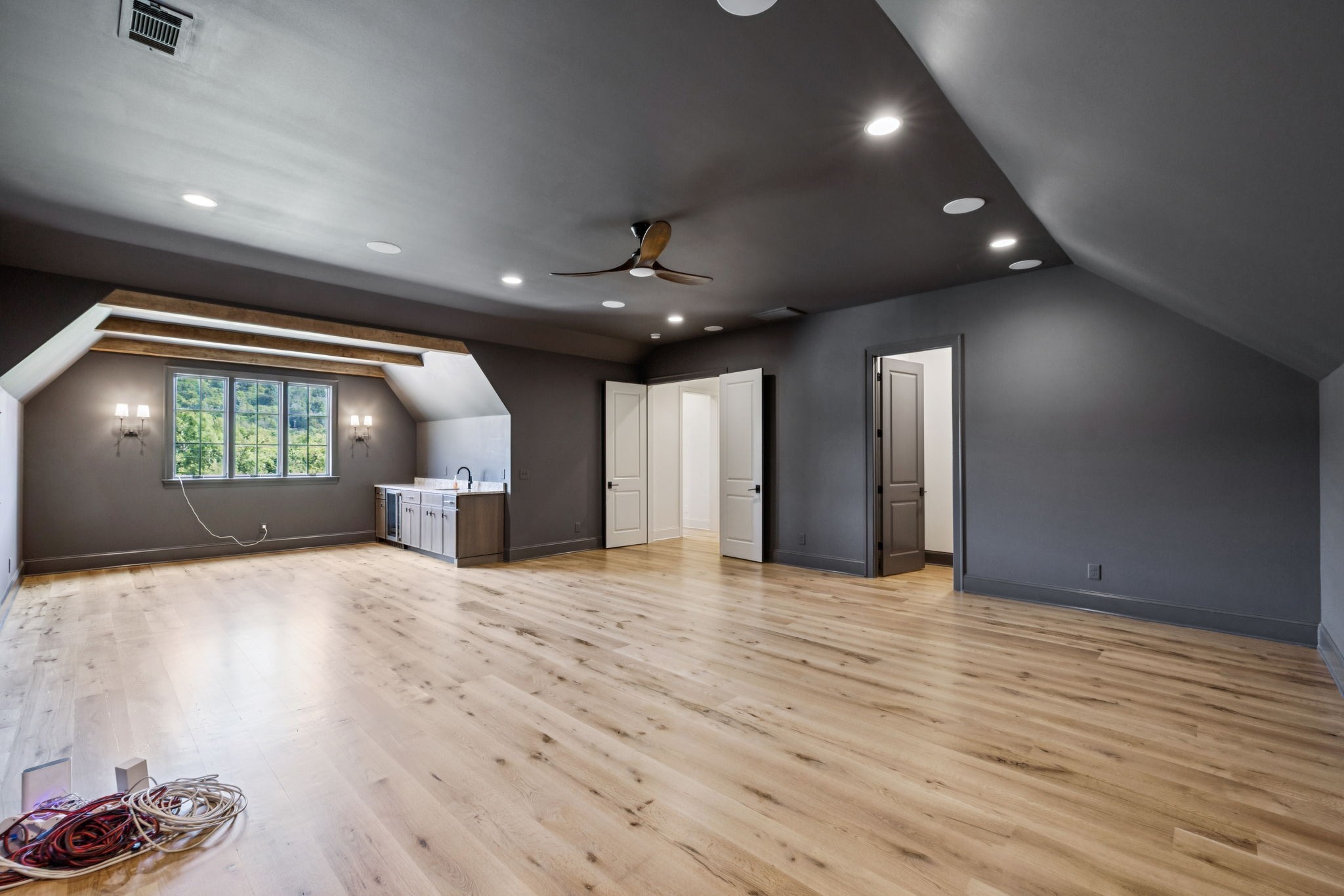 2245 Skinner Road Arrington, TN 37014 - Photo 58 of 98 a view of an empty room with a window and wooden floor