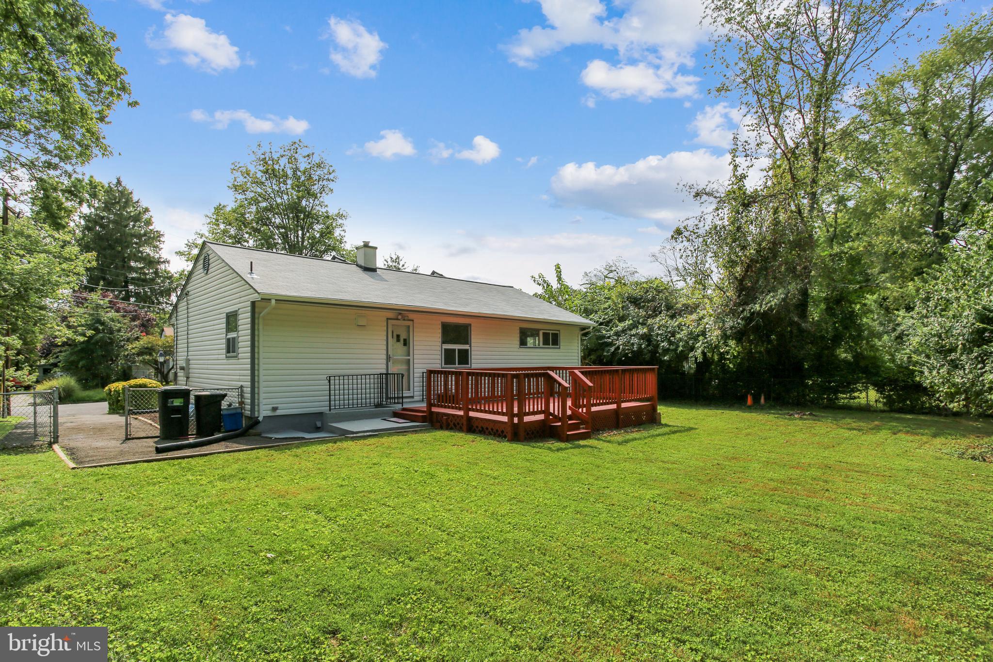 10216 Rodgers Road Fairfax, VA 22030 - Photo 2 of 20 a view of a house with a yard and sitting area