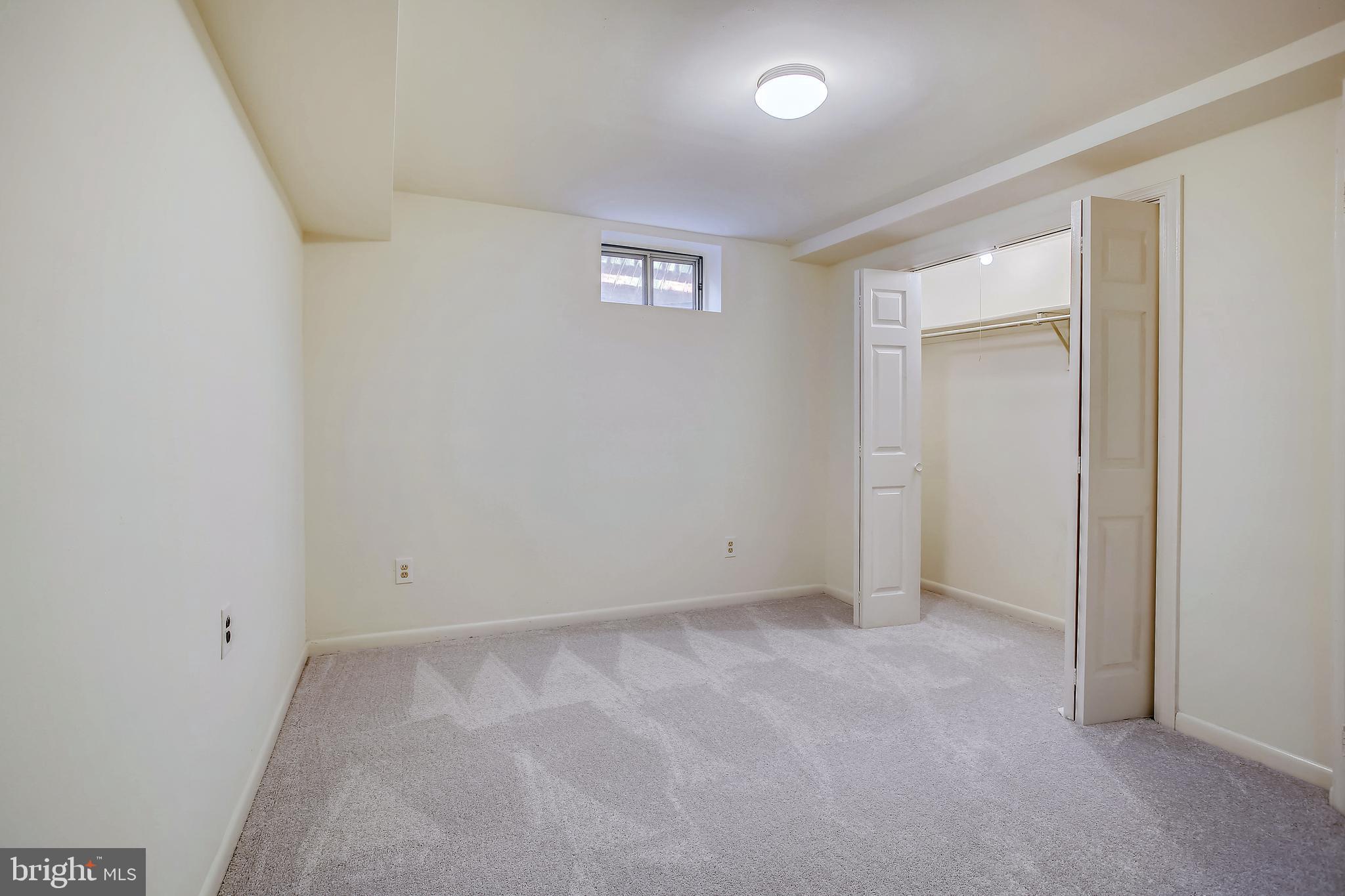 10216 Rodgers Road Fairfax, VA 22030 - Photo 17 of 20 an empty room with windows