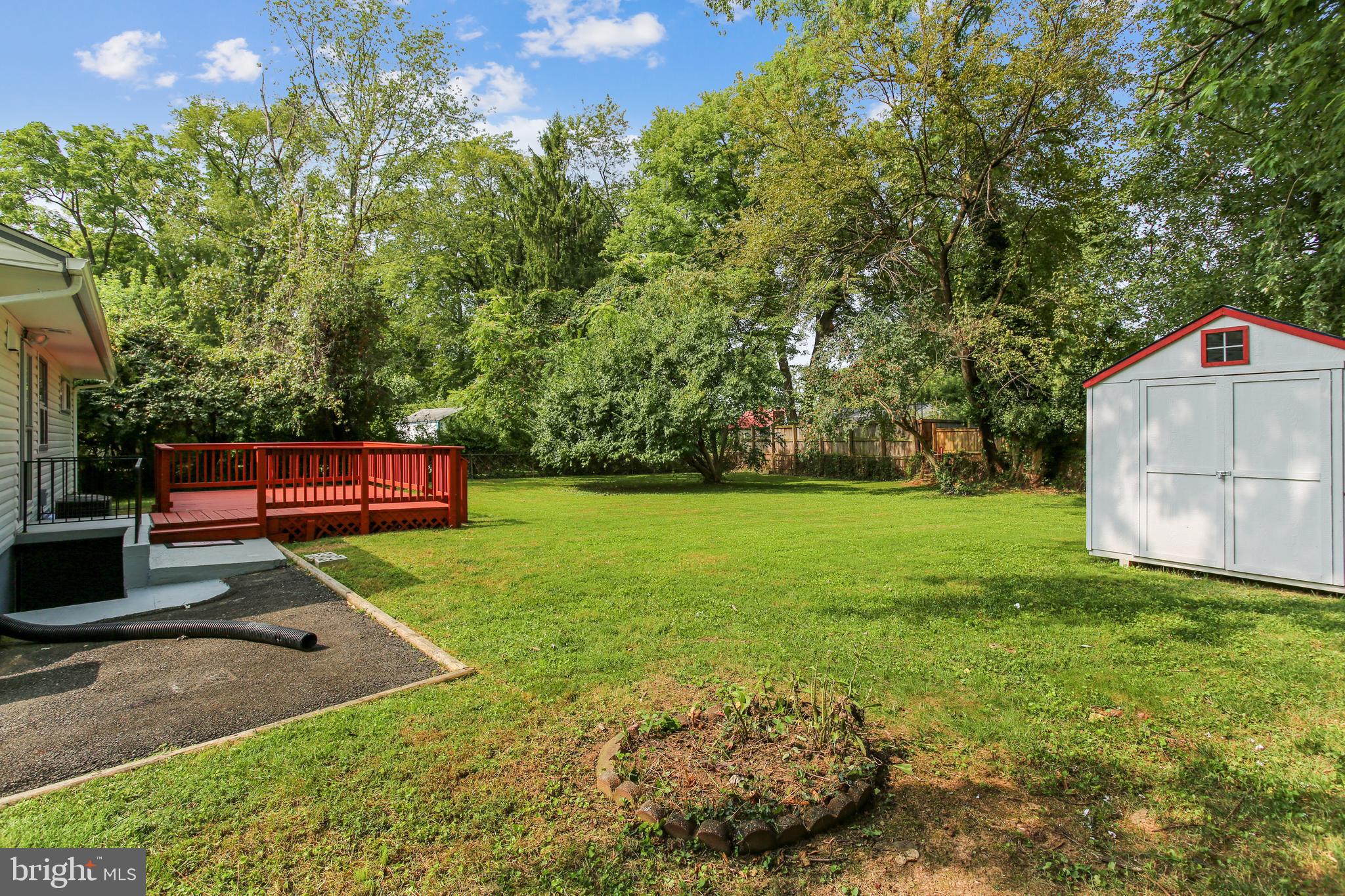 10216 Rodgers Road Fairfax, VA 22030 - Photo 3 of 20 a backyard of a house with lots of green space
