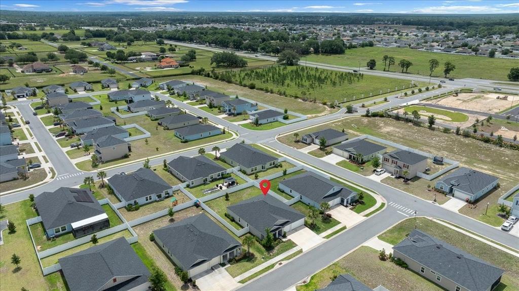 9329 Southwest 57th Terrace Ocala, FL 34476 - Photo 62 of 64 an aerial view of a city with lots of residential buildings