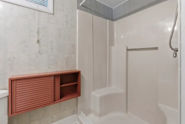 a view of a small space with wooden floor