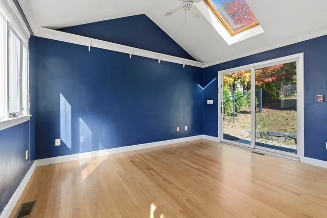 a view of empty room with windows