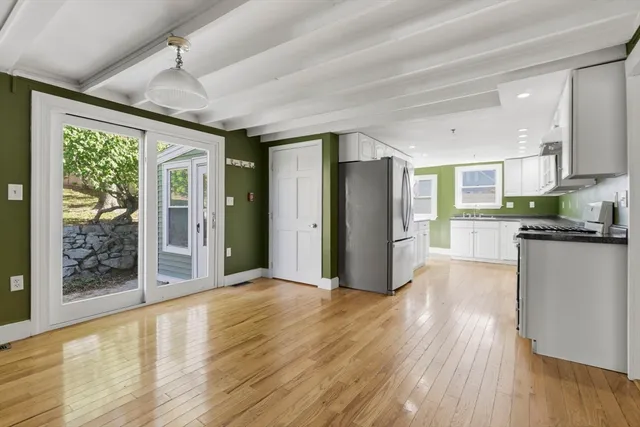 a picture of a bench in front of a wall