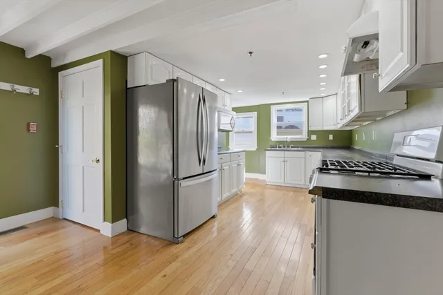a bathroom with a sink and mirror