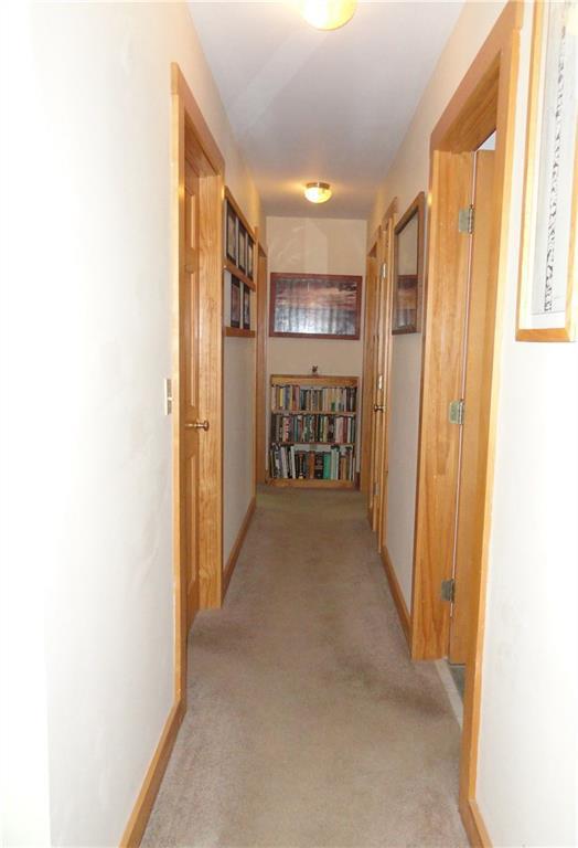 52 Cathedral Pines Road Damariscotta, ME 04543 - Photo 13 of 16 Hallway leading to bedrooms.