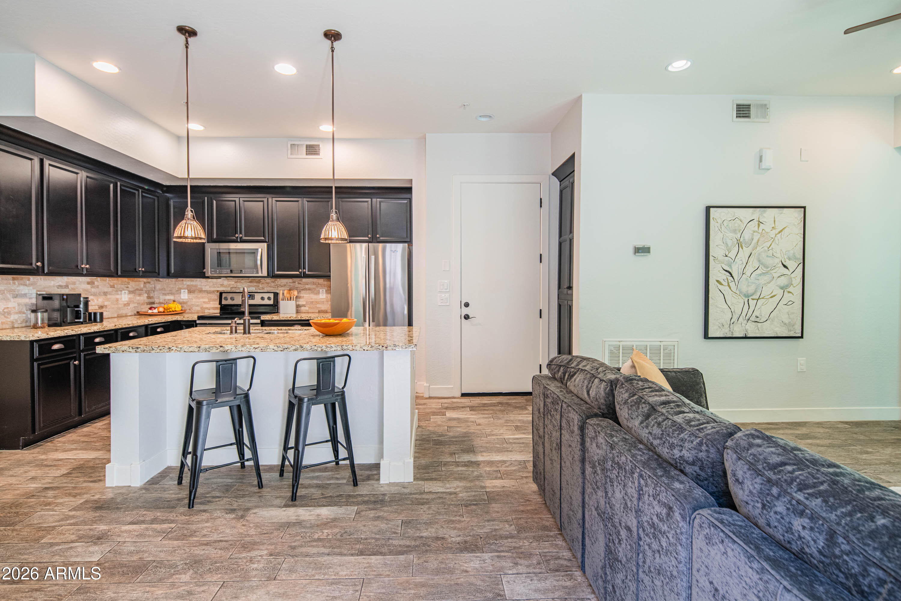 6565 East Thomas Road, Unit 1129 Scottsdale, AZ 85251 - Photo 6 of 31 Island w/ Counter Seating