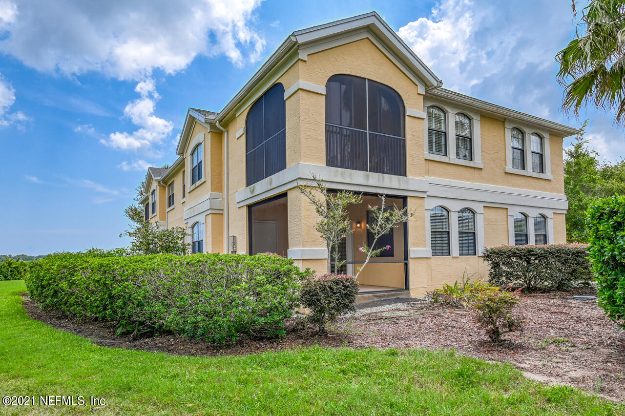 3400 Haley Pointe Road St. Augustine, FL 32084 - Photo 1 of 41 a front view of a house with a garden