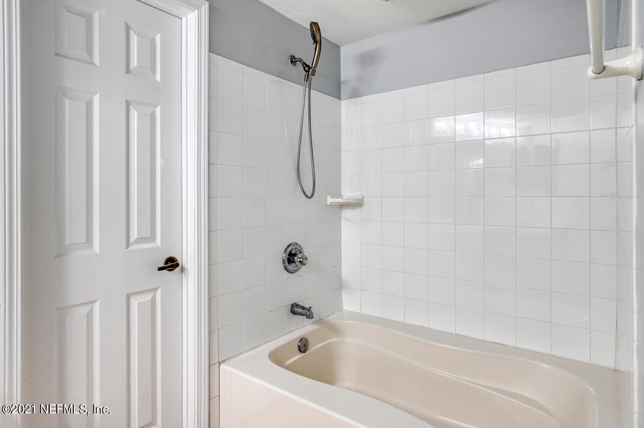 3400 Haley Pointe Road St. Augustine, FL 32084 - Photo 16 of 41 a white bath tub sitting next to a shower