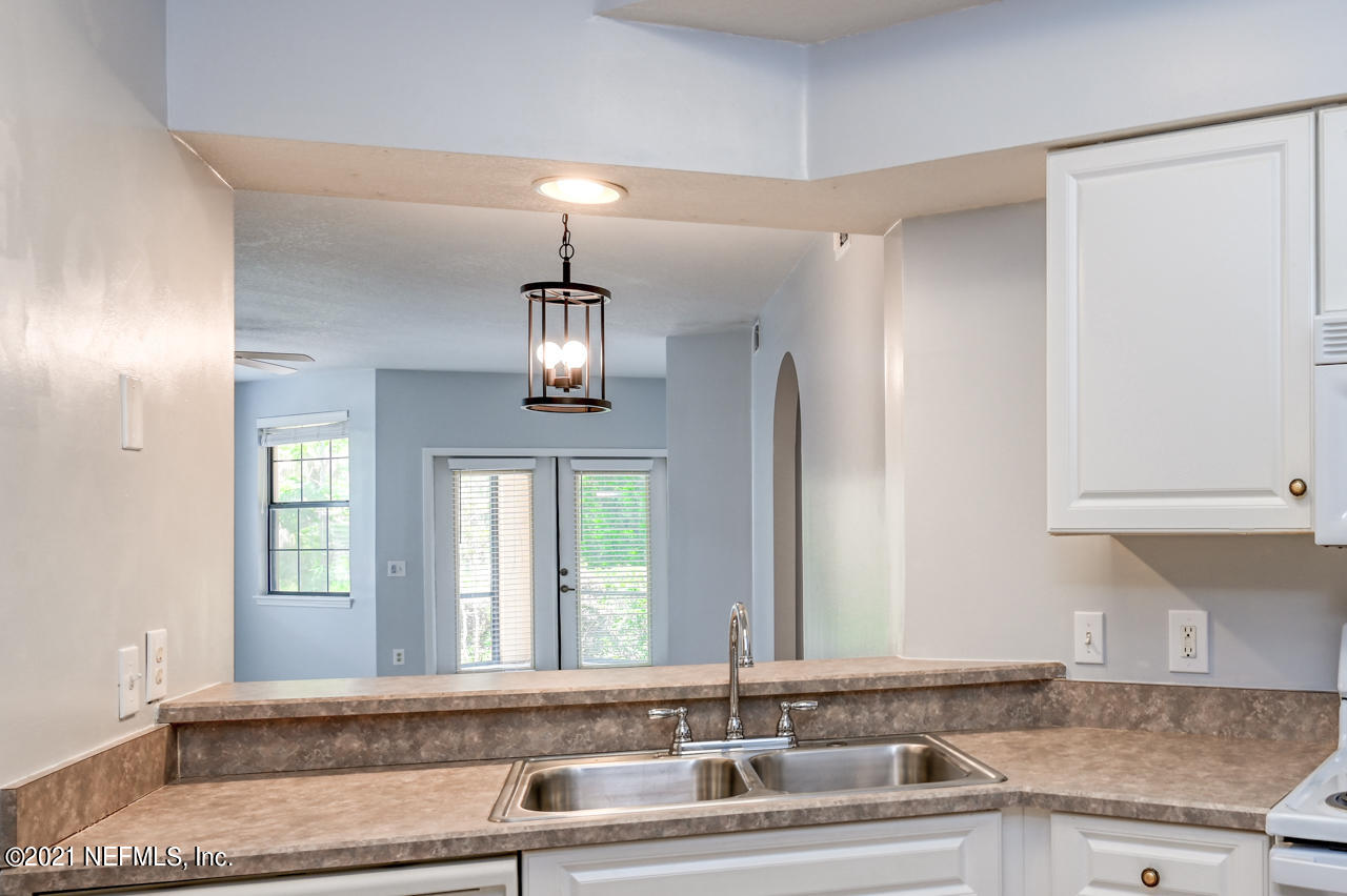 3400 Haley Pointe Road St. Augustine, FL 32084 - Photo 5 of 41 a bathroom with a sink and a mirror
