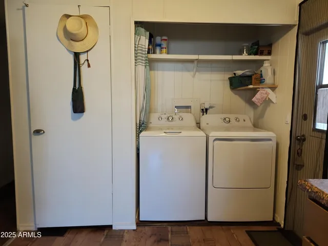 a utility room with dryer and washer