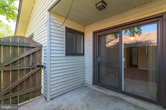 a view of front door and deck of the house